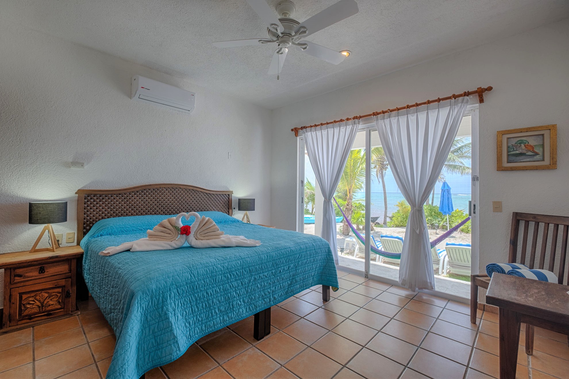Upper Level Air Conditioned Master Suite with Private Sea Balcony